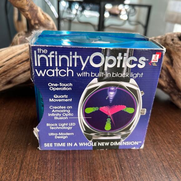 INFINITY OPTICS WATCH WITH BUILT IN BLACK LIGHT NEW IN BOX NOS New Dimension - Picture 1 of 6